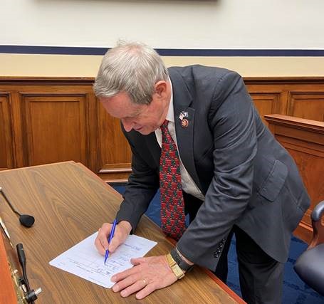 Congressman Wilson signing the NDAA Conference Report